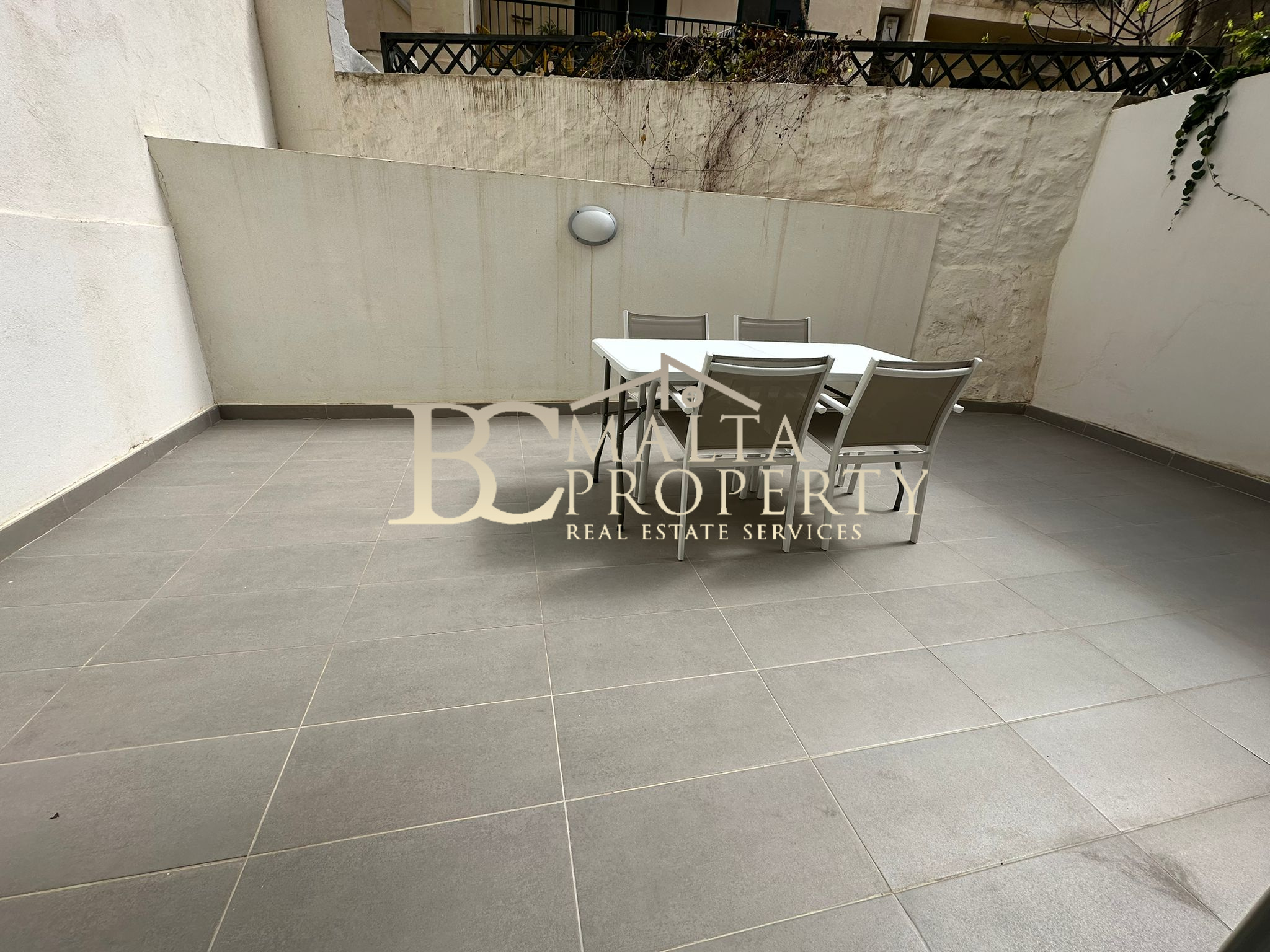 Sliema 1 Bedroom Apartment with Spacious Backyard side street with Surfside