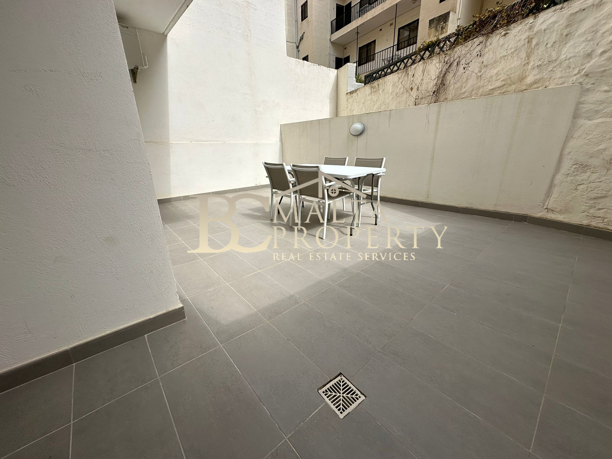 Sliema 1 Bedroom Apartment with Spacious Backyard side street with Surfside